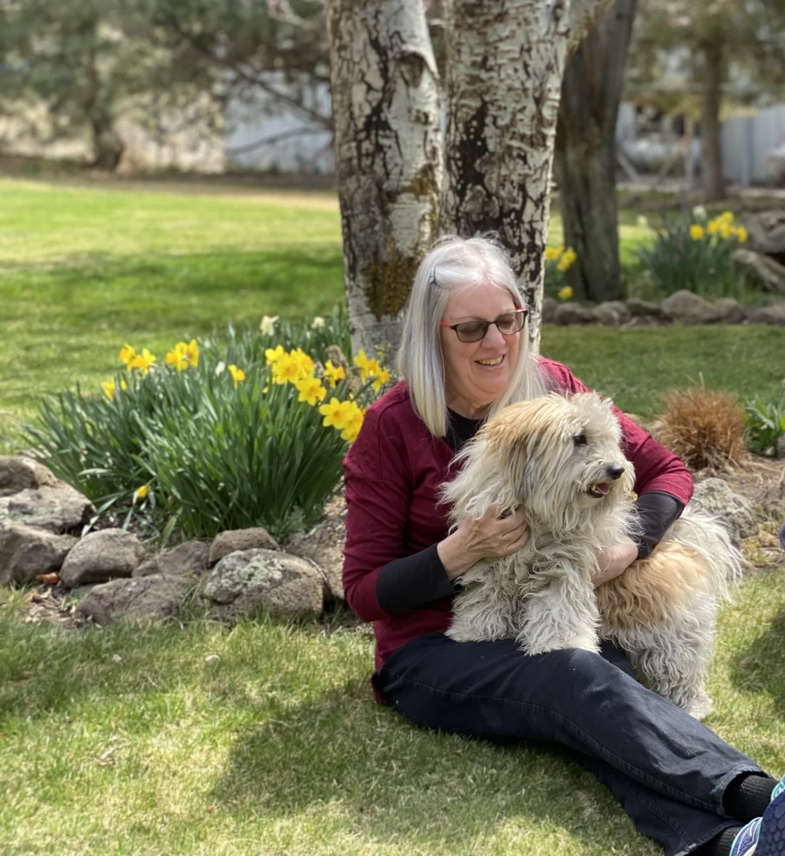 Sally-Ann enjoying a community event with a dog